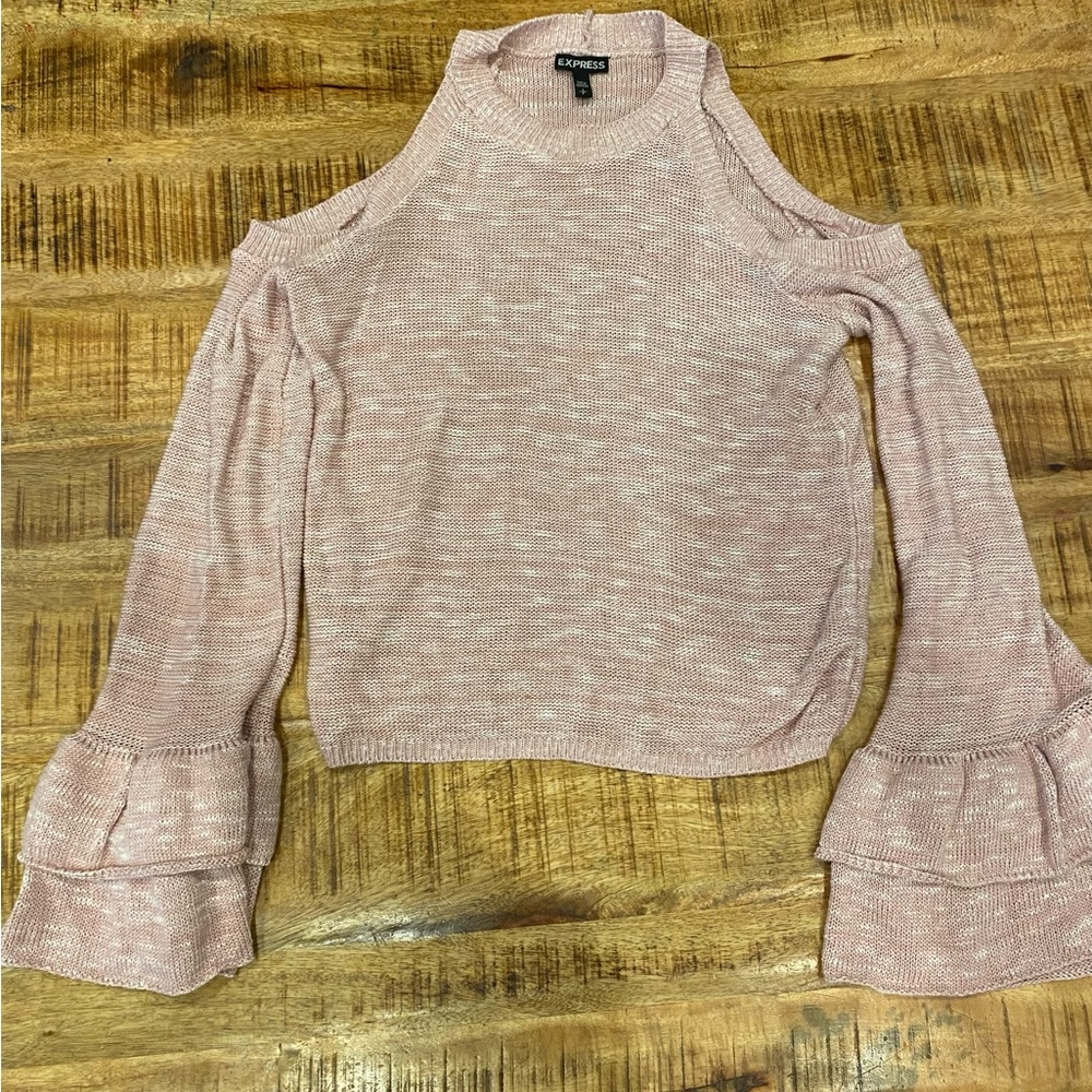 Express pink too with holes in shoulder and ruffled wrist!